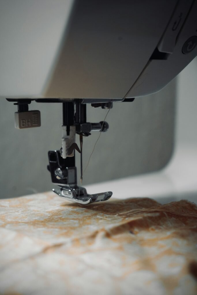 a close up of a sewing machine on a table